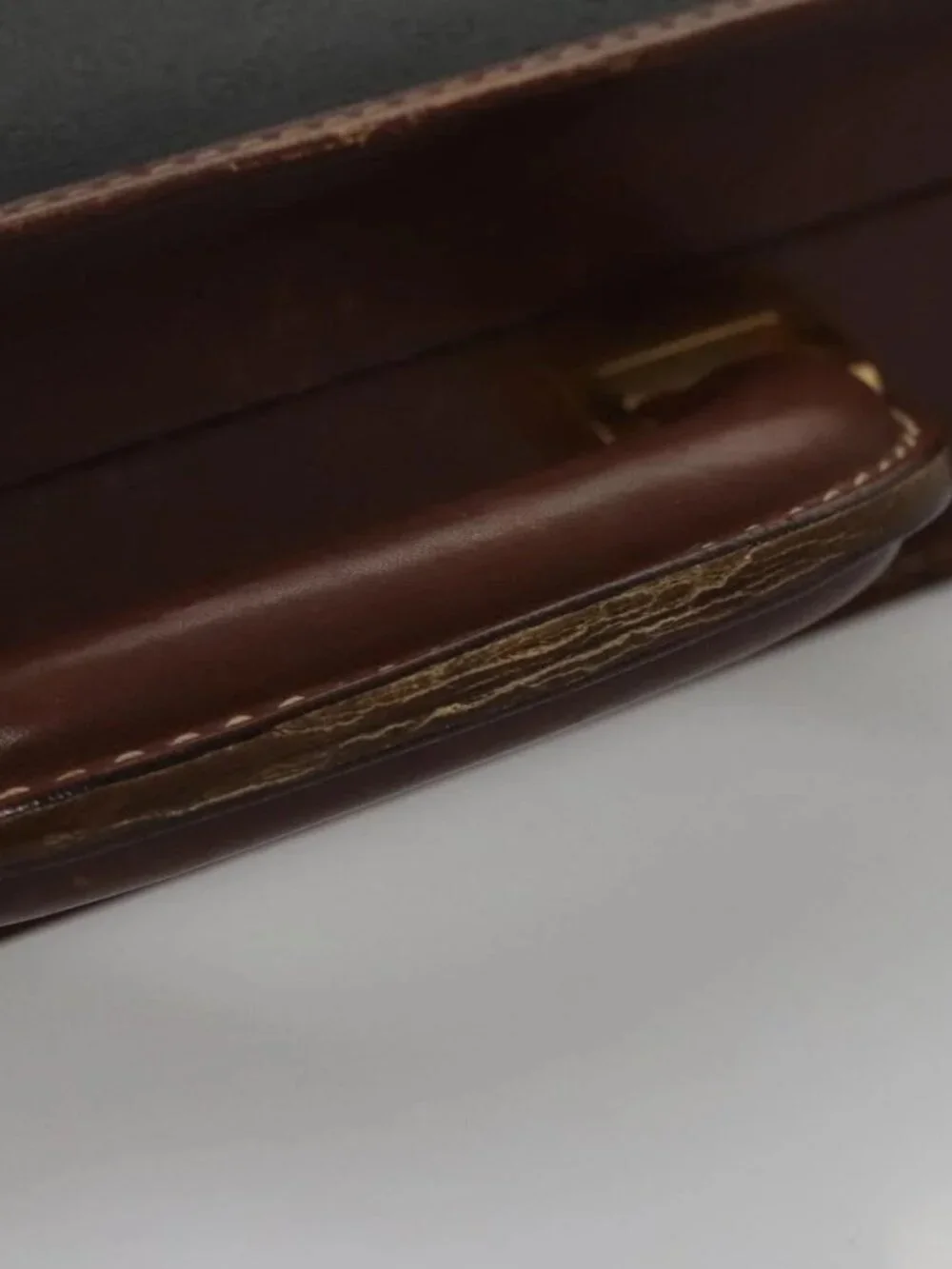 GUCCI Micro GG Canvas Trunk Black Gold